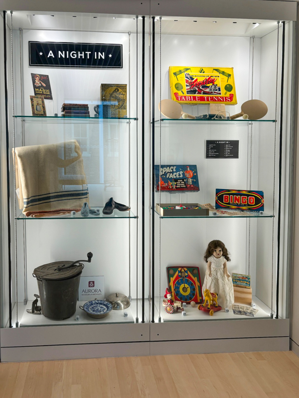 Gallery display with historical artifacts