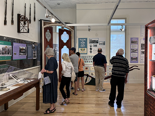 People looking at historical exhibits