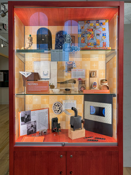 Display case in Aurora room, showing historical artifacts