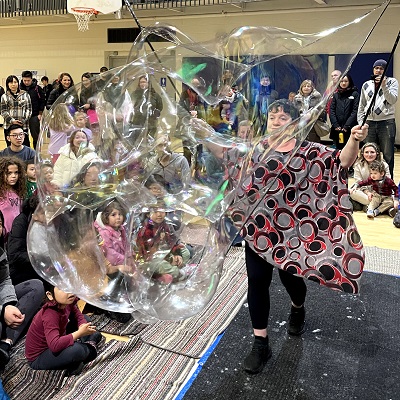 People watching a bubble display show