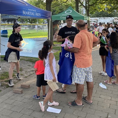 Residents attending Movies in the Park event