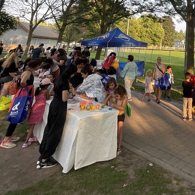 Residents attending Movies in the Park event