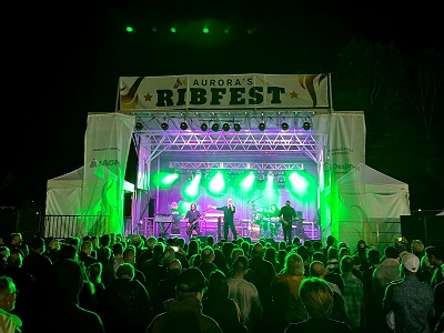 Music band playing on stage at event night