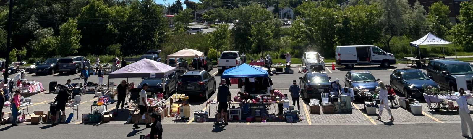 Image of Community Garage Sale Event with people selling items