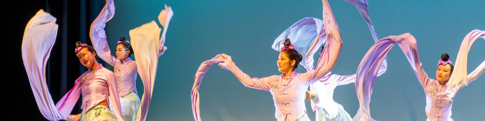 Five dancers from the Norman Dance Company on stage